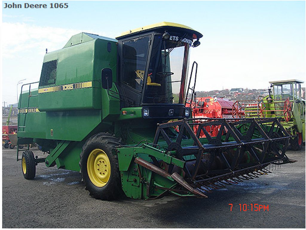 Oldtimer-Mähdrescher des Typs John Deere 1065, Neumaschine in Рівне (Bild 1)