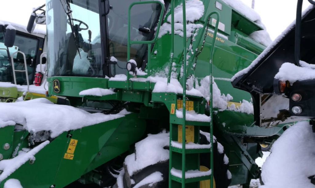 Oldtimer-Mähdrescher des Typs John Deere T670, Neumaschine in Рівне (Bild 5)