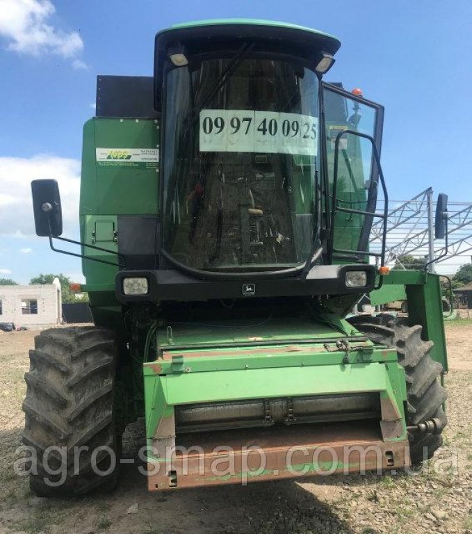 Oldtimer-Mähdrescher des Typs John Deere 1188, Neumaschine in Горохів (Bild 3)