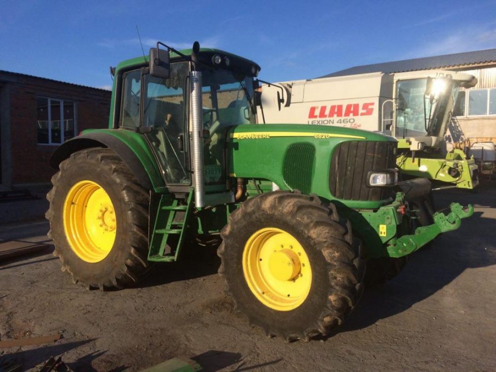 Oldtimer-Traktor des Typs John Deere 6820, Neumaschine in Рівне (Bild 1)