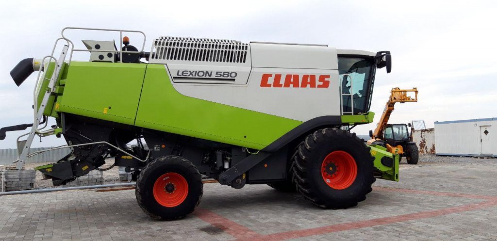 Oldtimer-Mähdrescher des Typs CLAAS Lexion 580, Neumaschine in Рівне (Bild 7)