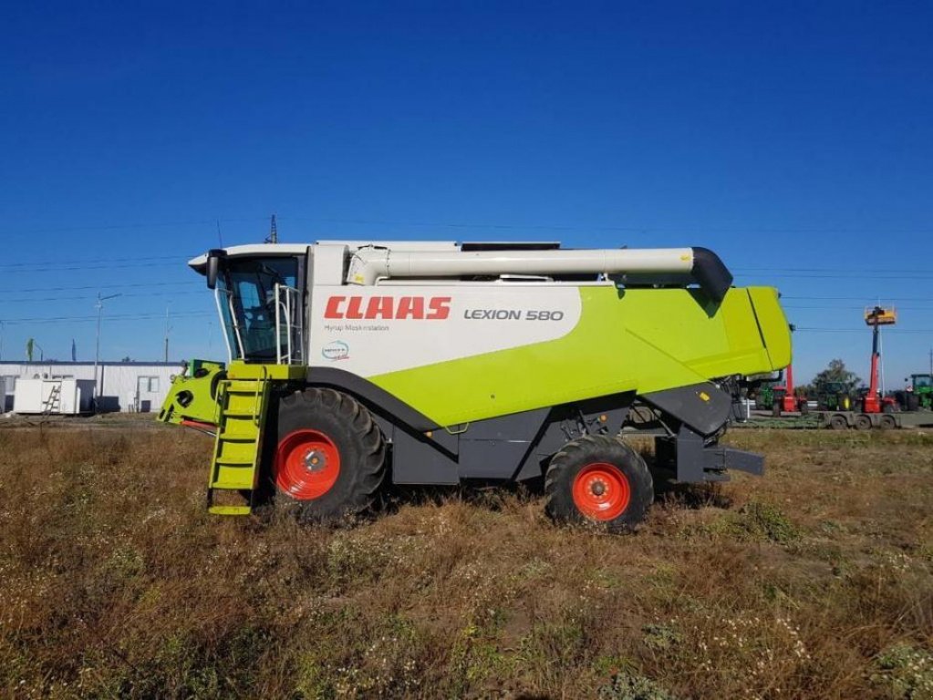 Oldtimer-Mähdrescher des Typs CLAAS Lexion 580, Neumaschine in Путрівка (Bild 10)